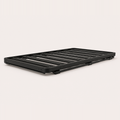 Slimline platform roof rack, low-profile black aluminium slatted grid — MobyGrid