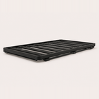 Slimline platform roof rack, low-profile black aluminium slatted grid — MobyGrid