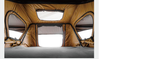 Rooftop tent interior with memory-foam mattress and windows