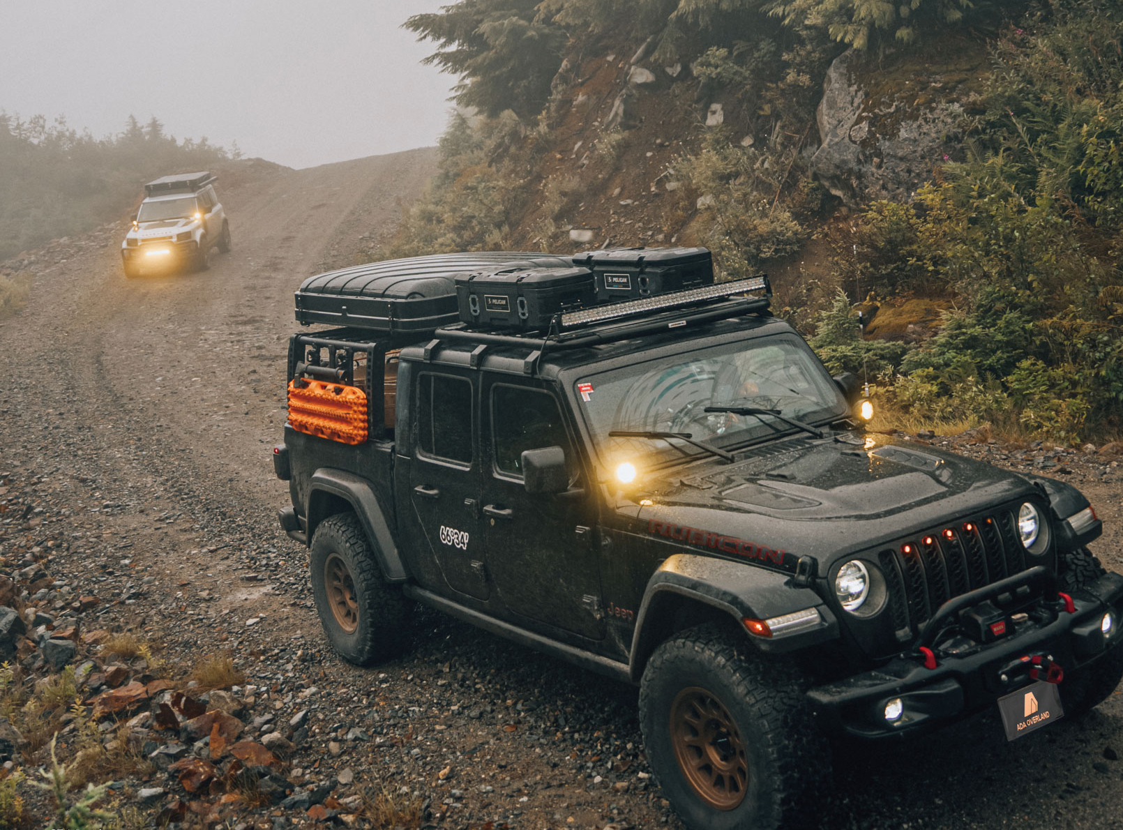 Rooftop tent mounted on a Jeep during a mountain overland trip